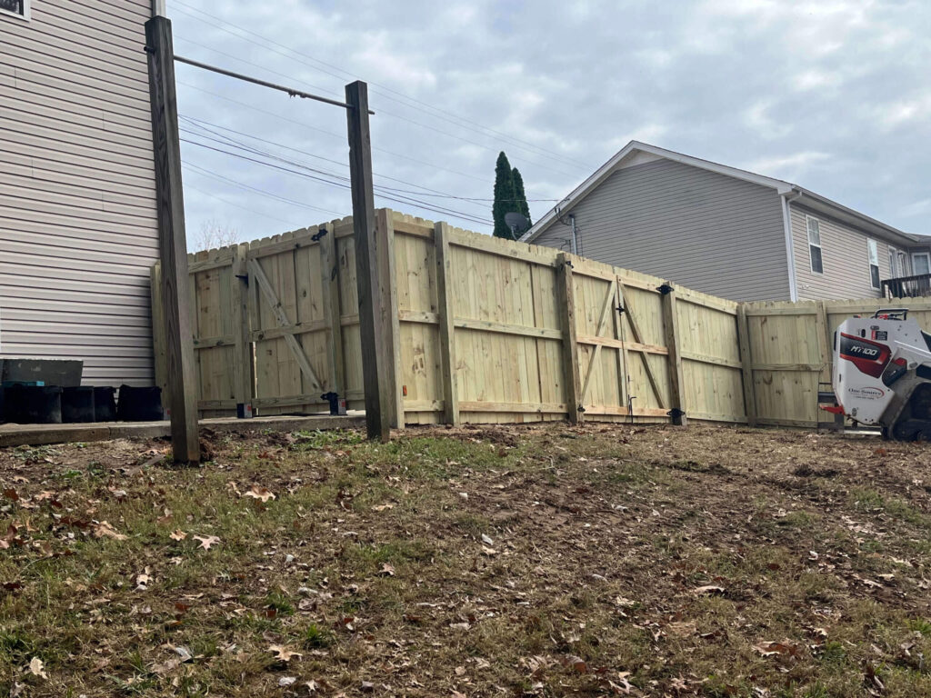 Durable Double Gate Wood Fence Installation